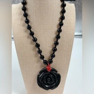 Black Rose and faceted beaded onyx Necklace red coral detail.